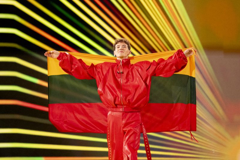 Silvester Belt walking the Flag Parade for Lithuania at the Grand Final in Malmö Arena